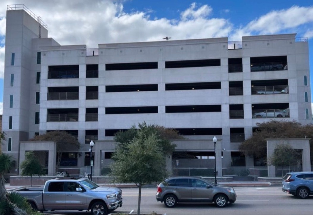 Building facade after pressure washing — clean, bright concrete